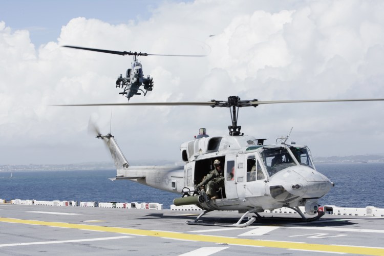 Image: U.S.M.C. UH-1N Huey and an AH-1W Super Cobra Helicopter